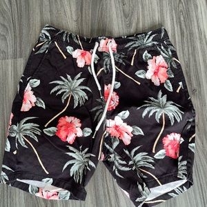 Forever 21 mens shorts with a hibiscus pattern.